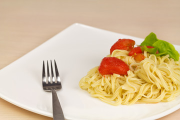 Noodle on a plate.