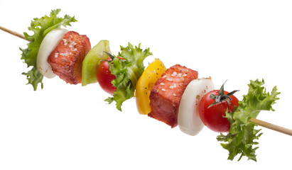 salmon with vegetables on a skewer