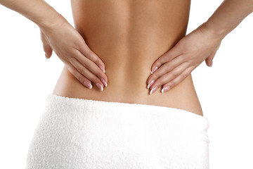 Closeup of a woman holding her painful back