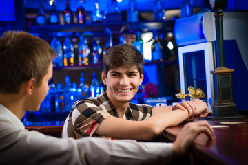 portrait of a young man at the bar