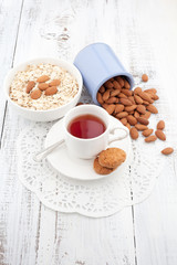 Breakfast with homemade cookies, oat and almond with cup of tea