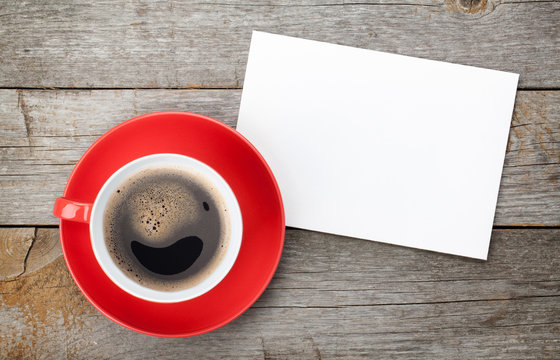 Blank valentines greeting card and red coffee cup
