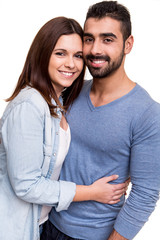 Couple posing over white background