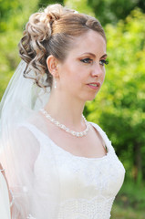 Fototapeta na wymiar Portrait of a beautiful bride 