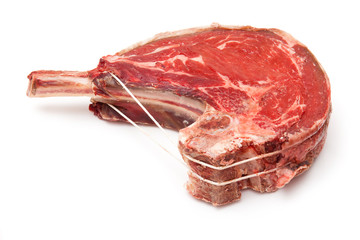 Rib of beef joint isolated on a white background.