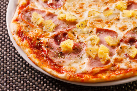 Pizza with pineapple and ham