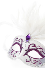 Carnival mask with feathers on white background
