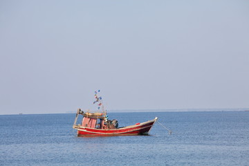 Naklejka premium Traditional fishing boat in the Bay of Bengal, Myanmar 