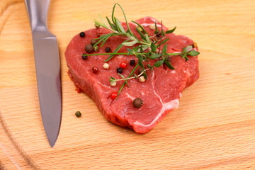 Juicy beef steak with spices and herbs