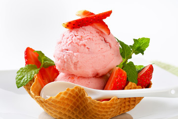 Strawberry ice cream in waffle basket