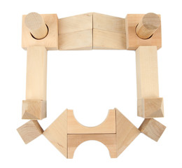 Wooden toy blocks isolated on white