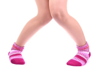 Female legs in colorful socks, isolated on white