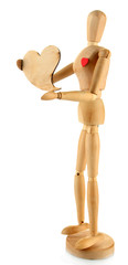 Wooden mannequin holding heart isolated on white