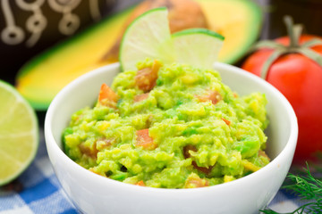 Guacamole with avocado, lime, tomato
