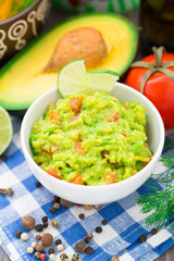 Guacamole with avocado, lime, tomato