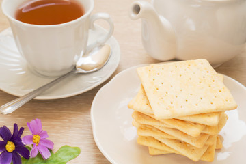 Crackers, cup of tea and pot