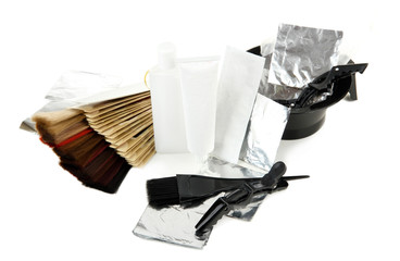 Hair dye kit and hair samples of different colors, isolated
