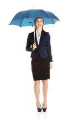 Beautiful caucasian business woman standing under umbrella.