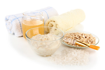 Homemade facial mask with oats and honey, isolated on white