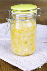Tasty lemon jam on table close-up