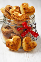 Coconut cookies heart shape in glass jar