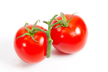 Fresh tomatoes isolated on white