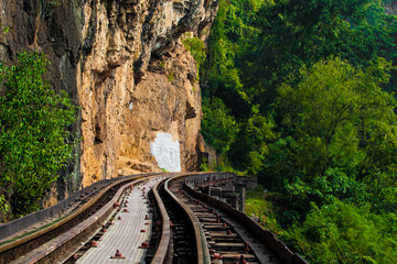 Fototapeta na wymiar Dead railway beside cliff, along Kwai river in Thailand