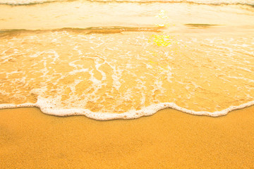 Soft wave of the sea, beach sand texture.