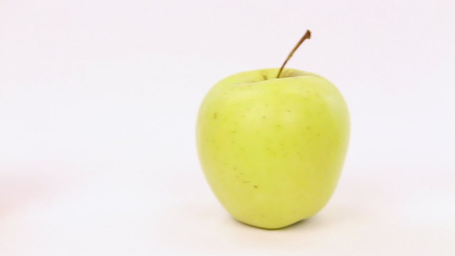Line of green apples with one red apple, be different