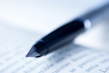 Close up of fountain pen on a book