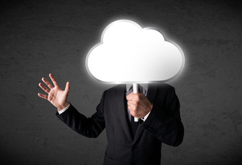 Businessman holding a cloud