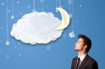 Businessman looking at cartoon night clouds with moon