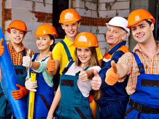 Group people in builder uniform.