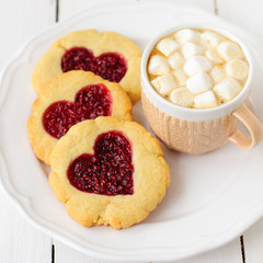 Homemade Cookies with Heart-Shaped Center and a Cup of Hot Choco