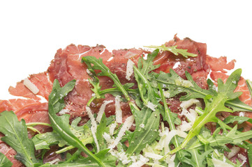 Beef Carpaccio with rucola and Parmesan cheese , isolated