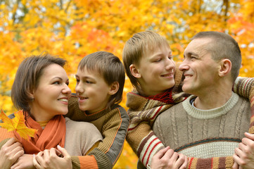 Fototapeta premium Pretty happy family for a walk