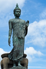 Big Buddha image with blue sky