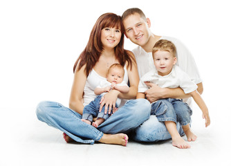 Young family four persons, smiling father mother and two childre