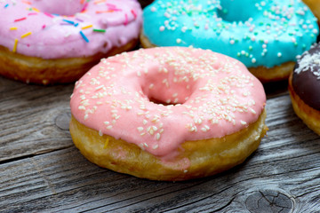 Donuts on a wooden background