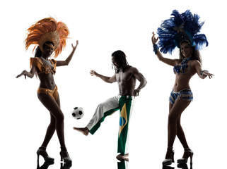 women samba dancer and soccer player man silhouette