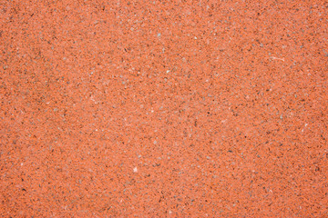 Playground red rough floor pattern background © Phototribe
