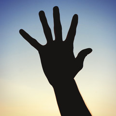 Silhouette of Hand on the Sky