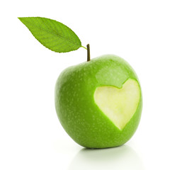 Green apple with cut heart