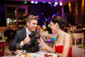 Smiling couple toasting