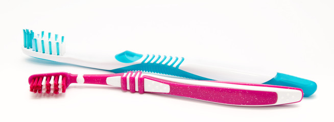 Two toothbrushes isolated on white