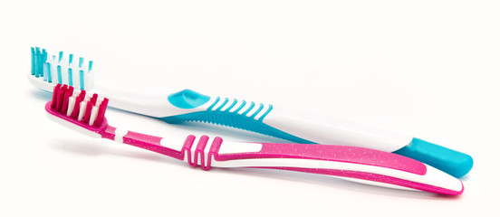 Two toothbrushes isolated on white background