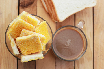 Toast with butter and sprinkling with sugar - hot coffee