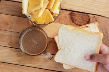 Toast with butter and sprinkling with sugar - hot coffee