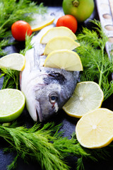 raw sea bream on a baking sheet