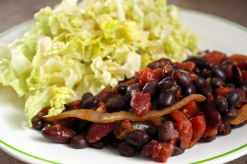 Nutritious vegetarian chili with a fresh garden salad